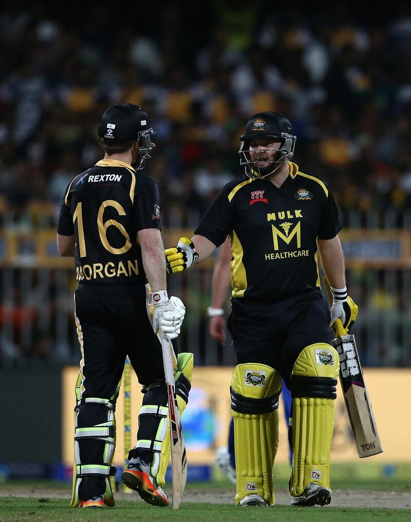 SHARJAH, UNITED ARAB EMIRATES - DECEMBER 14: Paul Stirling of Kerela Kings speaks to  Eoin Morgan of Kerela Kings during the T10 League match between Bengal Tigers and Kerala Kings at Sharjah Cricket Stadium on December 14, 2017 in Sharjah, United Arab Emirates.  (Photo by Francois Nel/Getty Images)