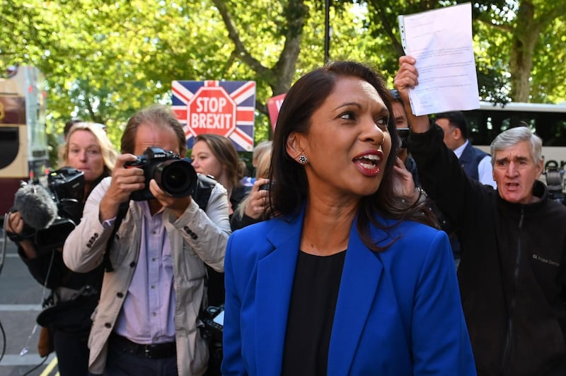 Business owner and anti-Brexit activist Gina Miller reacts as she leaves from Millbank television and radio studios, near the Houses of Parliament in Westminster, London on August 29, 2019.  Prime Minister Boris Johnson's suspension of parliament weeks before Britain's EU departure date faced legal challenges on Thursday following a furious outcry from pro-Europeans and MPs opposed to a no-deal Brexit. Gina Miller, a businesswoman and leading anti-Brexit campaigner, said she had applied for an urgent judicial review challenging "the effect and the intention" of the suspension. "We think that this request is illegal," said Miller, who in 2017 successfully won MPs the right to vote on formally starting to leave the EU in a court challenge. / AFP / DANIEL LEAL-OLIVAS
