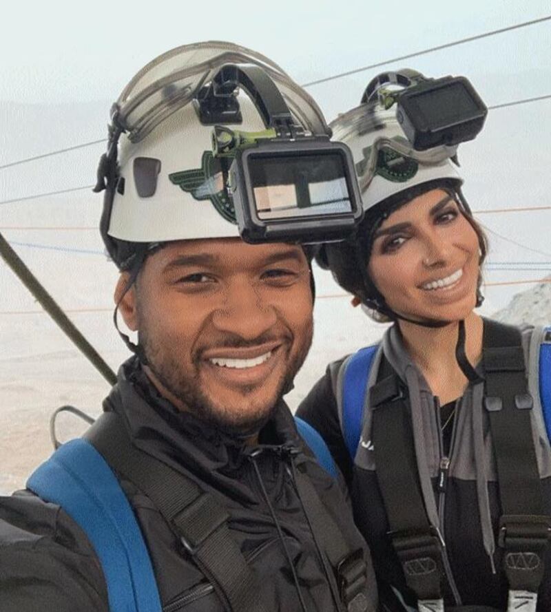 US rapper Usher taking on the world's longest zipline at the top of Jabal Jais, Ras Al Khaimah with Sara Al Madani on January 26. Instagram / Sara Al Madani