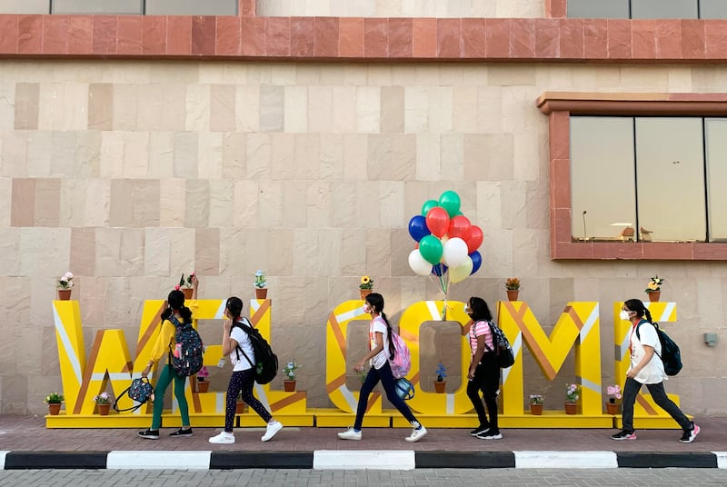 Students arriving for the first day of term at the Indian High School, Dubai, after the summer break. Pawan Singh / The National 