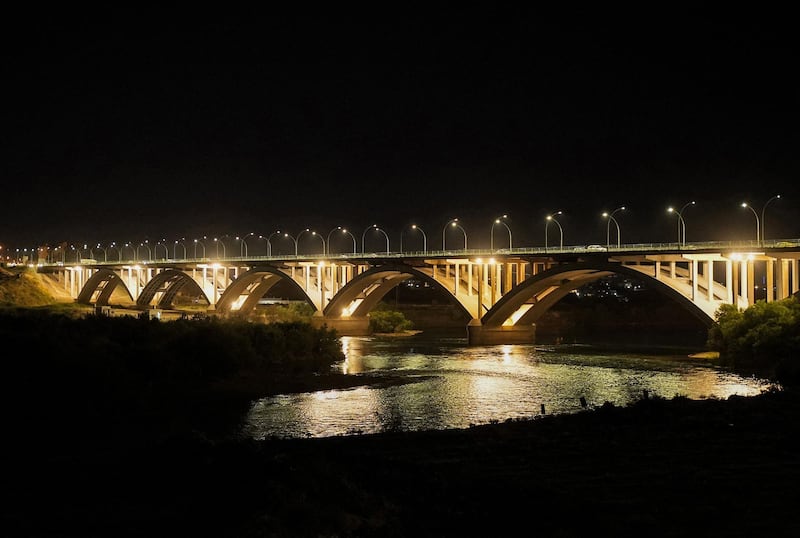 A view of Third Bridge across the Tigris in Mosul illuminated at night. AFP