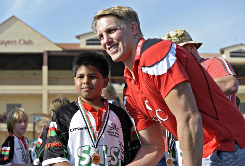 Lewis Moody meets participants at the HSBC Rugby Festival at the Rugby Sevens complex in Dubai City. Jeff Topping for The National