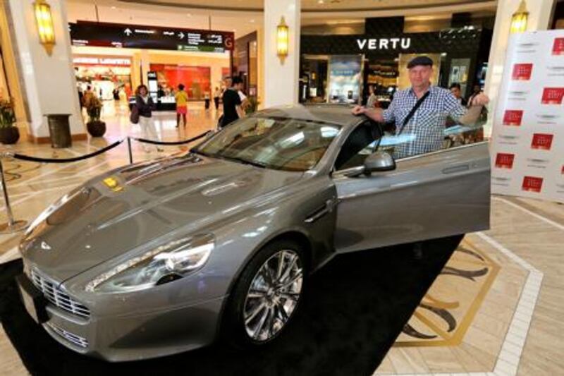 Serbian national Mitrovic Zoran wins the Dh760,000 Aston Martin Rapide at the Dubai Mall DSF raffle.