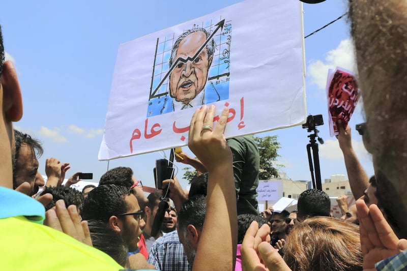 Jordanians gather at the professional Associations compound to participate at the country's strike refusing the new incom law draft put by the government and sent to the parliament, in Amman, Jordan, on May 30, 2018. (Salah Malkawi for The National)