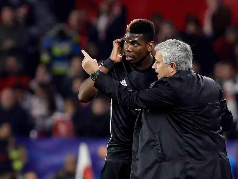 There have been numerous reports of disharmony between Paul Pogba, left, and manager Mourinho. Miguel Morenatti / AP Photo