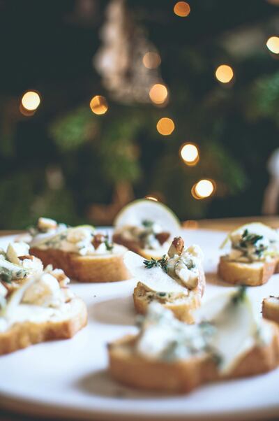Blue cheese, pear and walnut crostini. Photo by Scott Price