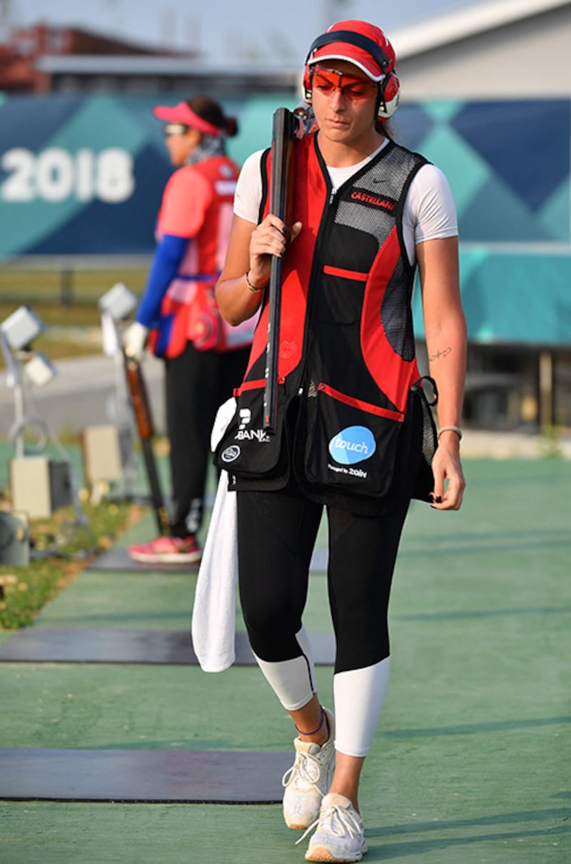 Lebanon's Ray Bassil competes in the trap mixed team shooting event at the 2018 Asian Games in Palembang on August 21, 2018. (Photo by ADEK BERRY / AFP)