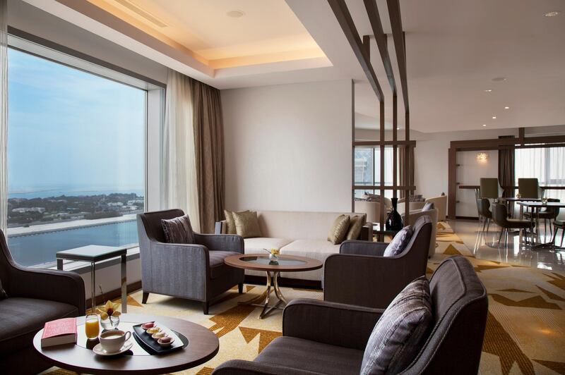 <p>The Club Lounge is comfortable and offers views of the Arabian Gulf. Courtesy Pearl Rotana Capital Centre