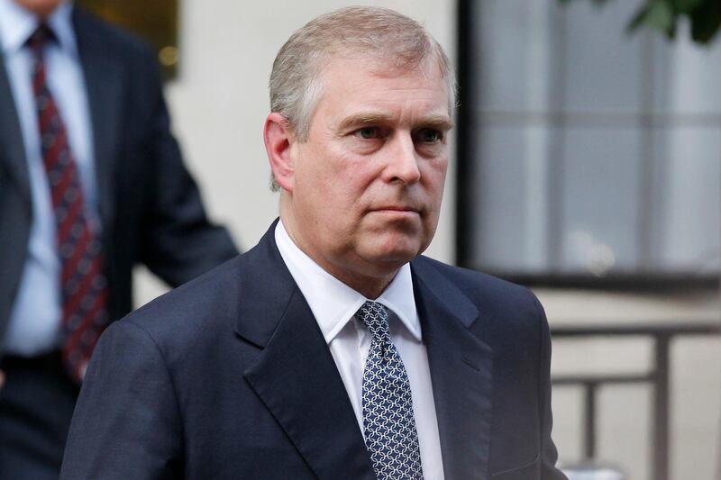 FILE - In this Wednesday, June 6, 2012 file photo, Britain's Prince Andrew leaves King Edward VII hospital in London after visiting his father Prince Philip. The woman who says she was a trafficking victim made to have sex with Prince Andrew when she was 17 is asking the British public to support her quest for justice. Virginia Roberts Giuffre tells BBC Panorama in an interview to be broadcast Monday, Dec. 2, 2019 evening that people â€œshould not accept this as being OK.â€ (AP Photo/Sang Tan, file)