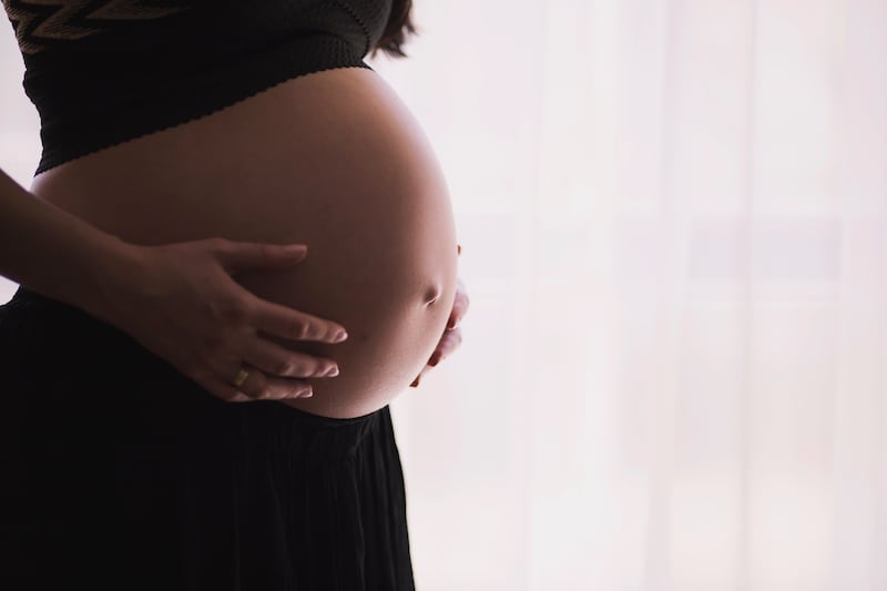 A multiple pregnancy carries a higher risk of premature delivery and neonatal death than a single pregnancy. Freestocks / Unsplash