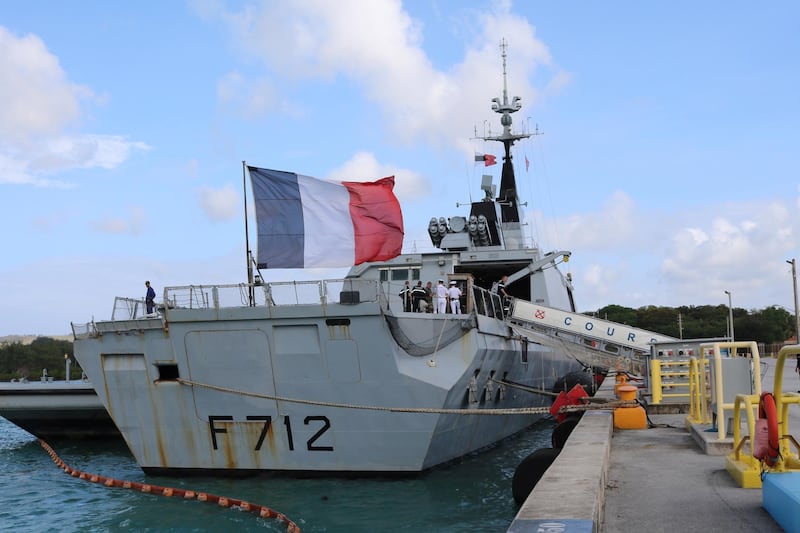 FILE - In this May 11 2017 file photo, the French stealth frigate Courbet is docked at Naval Base Guam, near Hagatna, Guam. rance is suspending its involvement in a NATO naval operation of Libya's coast after a standoff with a Turkish ship and amid growing tensions within the military alliance over Libya. France is also calling for crisis mechanism to prevent a repeat of an incident earlier this month between Turkish warships and the French naval vessel Courbet in the Mediterranean. (AP Photo/Haven Daley)