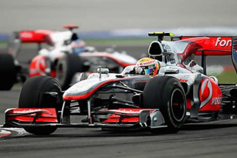 Lewis Hamilton of McLaren leads from teammate Jenson Button on his way to winning the Turkish Grand Prix.