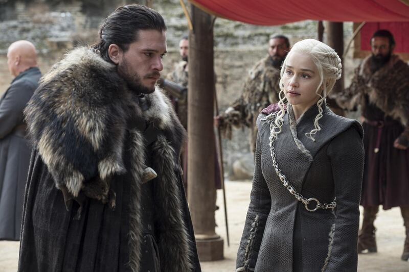 This image released by HBO shows Kit Harington, left, and Emilia Clarke on the season finale of "Game of Thrones." The series set yet another audience record Sunday with its seventh-season finale. Nielsen says an all-time high of 12.1 million viewers were tuned in to the wildly popular fantasy drama. An additional 4 million caught the episode on streaming channels. (Macall B. Polay/HBO via AP)