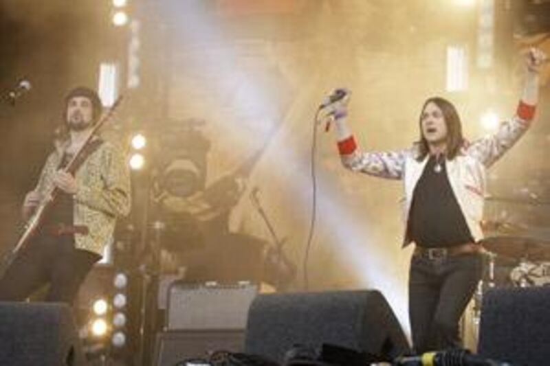 The guitarist Serge Pizzorno and the singer Tom Melghan of Kasabian perform at last month's Glastonbury Festival.