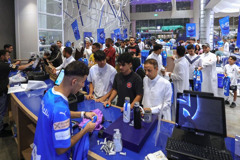 Fans of Saudi club Al Hilal line up to buy Neymar shirts at the club's official store in Riyadh following the Brazil star's move to the SPL. AFP