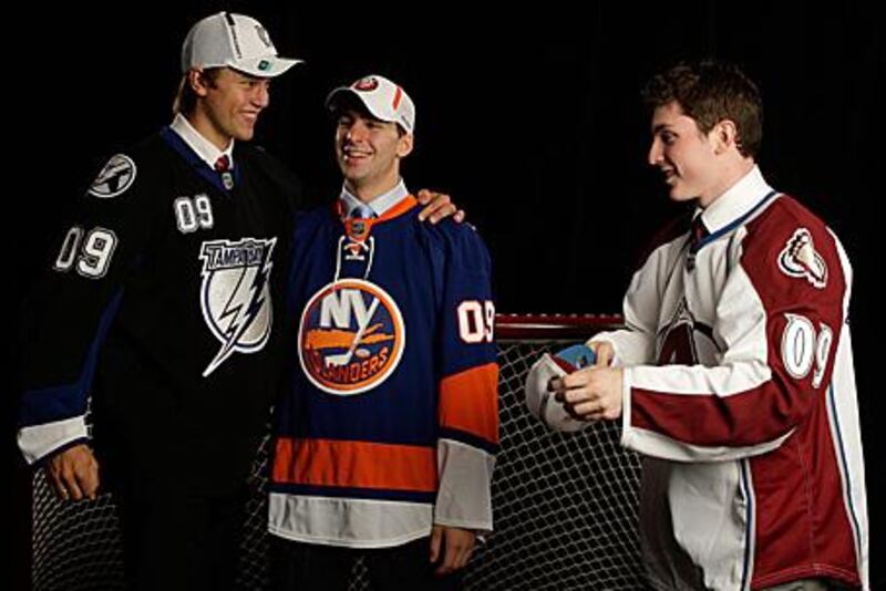 Tavares is flanked by the second pick, Victor Hedman of the Tampa Bay Lightning, left, and Matt Duchene, who was picked by the Colorado Avalanche with the third pick in Montreal.