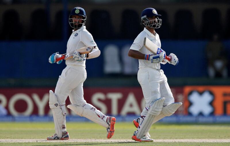 Cricket - Sri Lanka v India - Second Test Match - Colombo, Sri Lanka - August 3, 2017 - India's Cheteshwar Pujara and Ajinkya Rahane run between wickets. REUTERS/Dinuka Liyanawatte