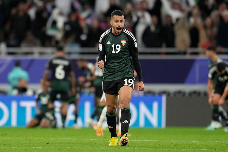 The UAE's Khaled Al Dhanhani celebrates Khalifa Al Hammadi's equaliser. AP 