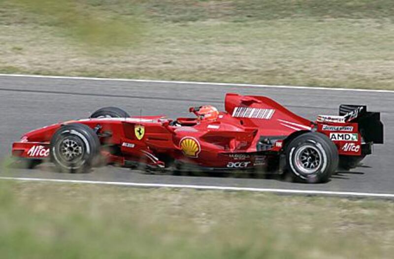Michael Schumacher test drives the 2007 Ferrari F60 racing car around Mugello in Italy. Williams has blocked Ferrari's appeals to let the returning driver to test the 2009 car.