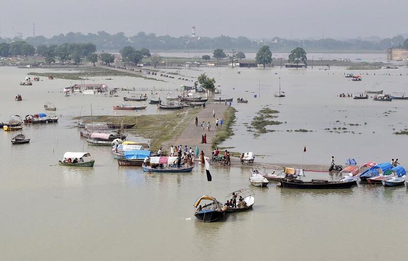 A flooded road on the banks of river Ganga, in Allahabad, India. Jitendra Prakash / Reuters