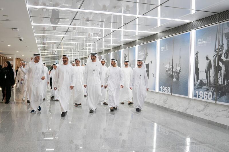 ABU DHABI, UNITED ARAB EMIRATES - November 04, 2019:  HH Sheikh Mohamed bin Zayed Al Nahyan, Crown Prince of Abu Dhabi and Deputy Supreme Commander of the UAE Armed Forces (2nd L) tours the new expansion and development work at the Abu Dhabi National Oil Company (ADNOC) Headquarters. Seen with HE Mohamed Mubarak Al Mazrouei, Undersecretary of the Crown Prince Court of Abu Dhabi (back R), HE Dr Sultan Ahmed Al Jaber, UAE Minister of State, Chairman of Masdar and CEO of ADNOC Group (3rd R) and HH Sheikh Hamed bin Zayed Al Nahyan, Chairman of the Crown Prince Court of Abu Dhabi and Abu Dhabi Executive Council Member (back C).

( Hamad Al Kaabi / Ministry of Presidential Affairs )​
---