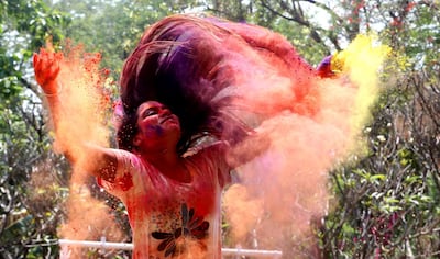 epa09093022   Indian college girls take part in the Holi festival celebrations in Bhopal, India, 24 March 2021. Holi is celebrated on the full moon day and marks the beginning of the spring season. Holi will be celebrated as the Hindu spring festival of colors across the country on 29 March.  EPA/SANJEEV GUPTA