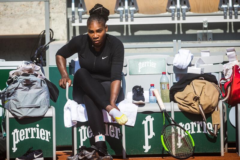 epa06761953 Serena Williams of the USA during a training session on a court at Roland Garros in Paris, France, 25 May 2018. The 117th French Open tennis tournament starts with its first round matches on 27 May 2017.  EPA/CHRISTOPHE PETIT TESSON