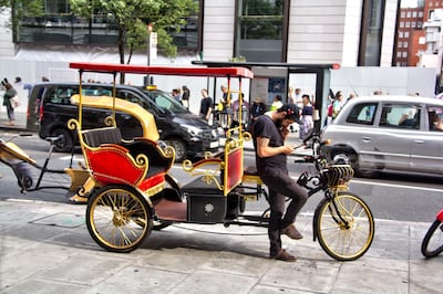 The designs of London's bike taxis go from outrageously gaudy to bare and functional. Shahzad Sheikh for The National