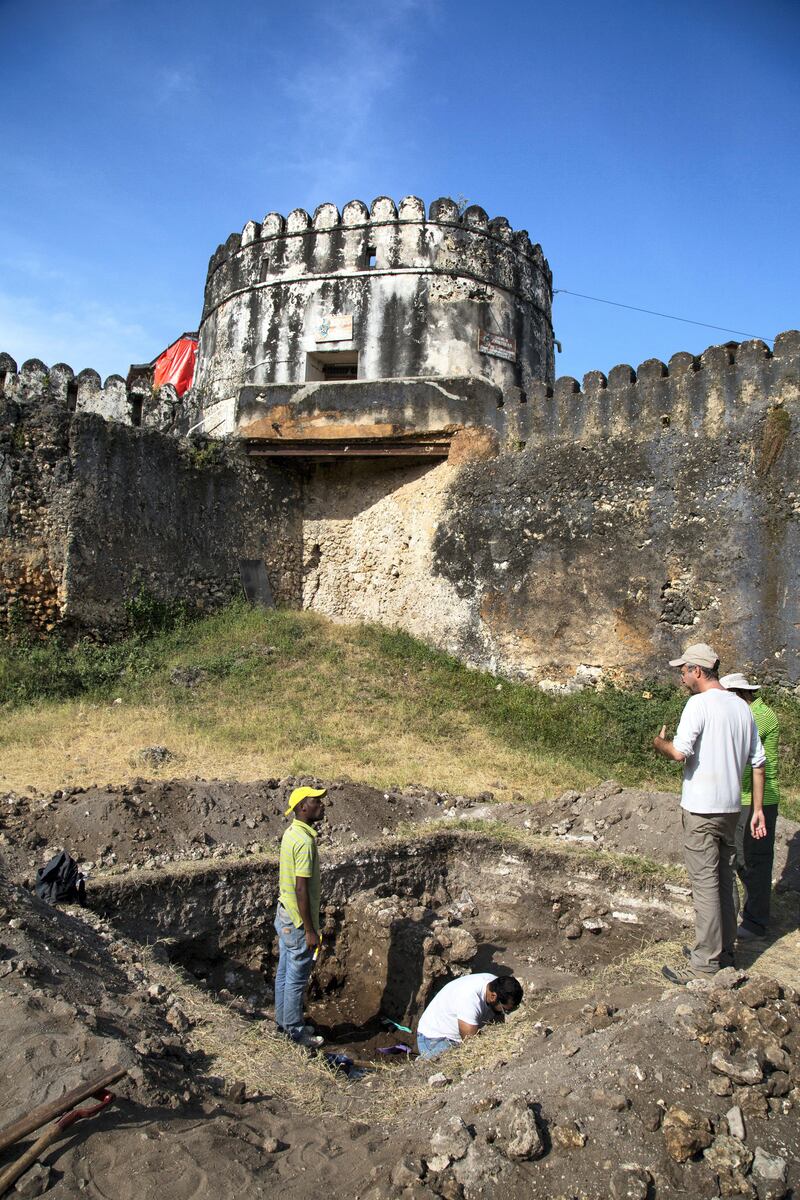 Dr Timothy Power, an assistant professor at Zayed University in Abu Dhabi, inspects a trench inside the 18th century Omani fortress in Stone Town, Zanzibar.