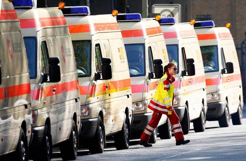 Ambulances line up near the Charite hospital in Berlin while a bomb from the Second World War is defused nearby on April 20, 2018. Felipe Trueba / EPA