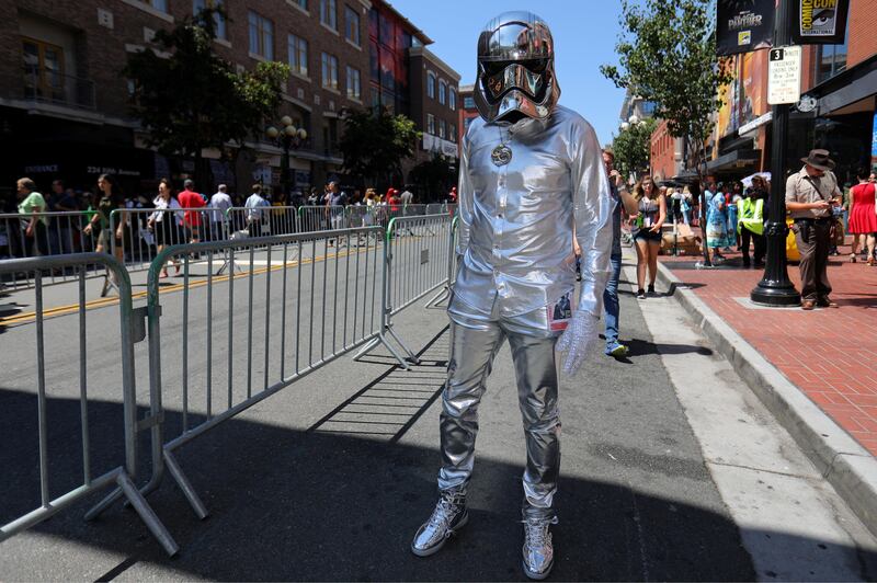 An attendee stops to pose for a picture outside Comic Con International. Mike Blake / Reuters