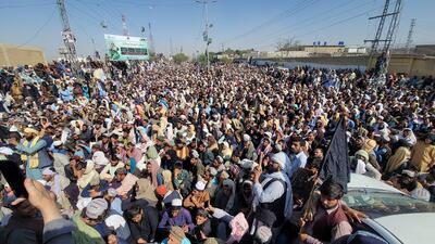 Traders gather to protest after the Pakistani authorities introduced the 'one-document regime' policy, in Chaman, near the Afghan border in Pakistan, on October 26.  Beginning in November 2023, all Afghan nationals entering Pakistan will need to show a valid passport and visa. The new policy replaces previous special travel permit allowances for divided tribes along the 2,600-km border. EPA