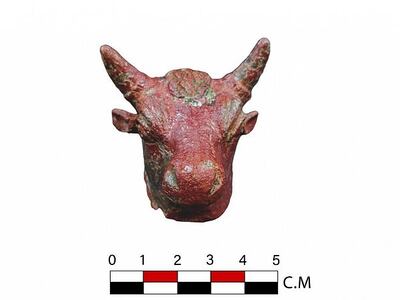 An ancient bronze bull's head found at Al-Ukhdood. The animal was cherished among pre-Islamic kingdoms as a symbol of fertility and health. Photo: Heritage Commission