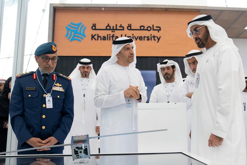 ABU DHABI, UNITED ARAB EMIRATES - February 20, 2019: HH Sheikh Mohamed bin Zayed Al Nahyan, Crown Prince of Abu Dhabi and Deputy Supreme Commander of the UAE Armed Forces (R) visits Khalifa University stand, during the 2019 International Defence Exhibition and Conference (IDEX), at Abu Dhabi National Exhibition Centre (ADNEC). Seen with HE Major General (Ret) Khaled Abdullah Al Bu Ainain, President of the Institute for Near East and Gulf Military Analysis (INEGMA) (2nd R) and HE Major General Essa Saif Al Mazrouei, Deputy Chief of Staff of the UAE Armed Forces (L).
( Ryan Carter for the Ministry of Presidential Affairs )
---