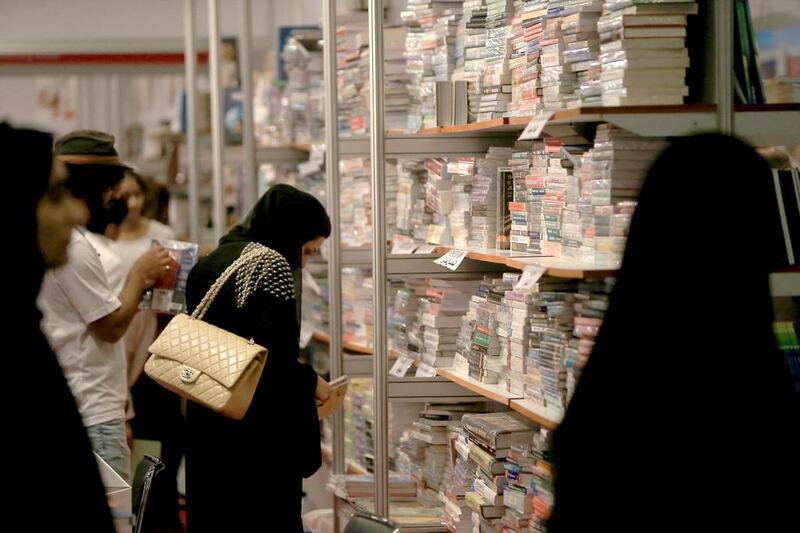 Visitor tours the stalls at Abu Dhabi book festival at Adnec. Ravindranath K / The National
