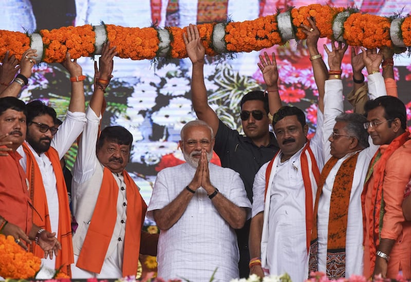 Indian Prime Minister and Bharatiya Janata Party (BJP) leader Narendra Modi gestures during a campaign rally in Kolkata, India. AFP