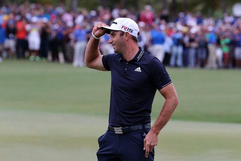 Dustin Johnson celebrates after winning the WGC-Cadillac Championship last weekend in Miami, Florida. Sam Greenwood / Getty Images / AFP / March 8, 2015