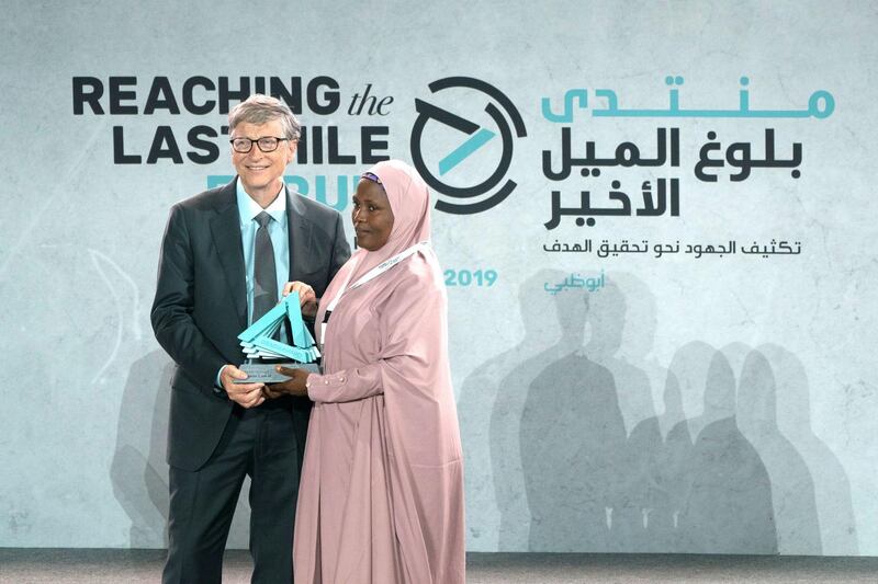 SAADIYAT ISLAND, ABU DHABI, UNITED ARAB EMIRATES - November 19, 2019: Bill Gates, Co-chair and Trustee of Bill & Melinda Gates Foundation (L) presents an awards, during the Reaching the Last Mile Forum, at the Louvre Abu Dhabi.

( Eissa Al Hammadi for the Ministry of Presidential Affairs )
---