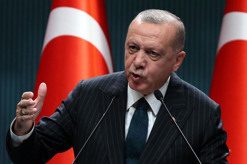 Turkish President Recep Tayyip Erdogan holds a press conference following the weekly cabinet meeting at the Presidential Complex in Ankara on August 24, 2020.  / AFP / Adem ALTAN
