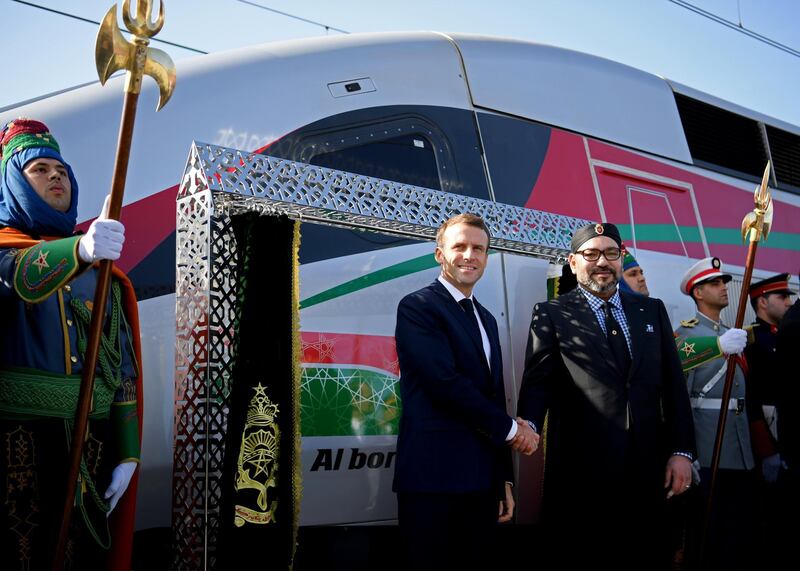 REFILE - CORRECTING LOCATION  French President Emmanuel Macron and Moroccan King Mohammed VI pose for a photograph as they inaugurate a high-speed line at Tangier train station, in Tangier, Morocco November 15, 2018. Christophe Archambault/Pool via Reuters