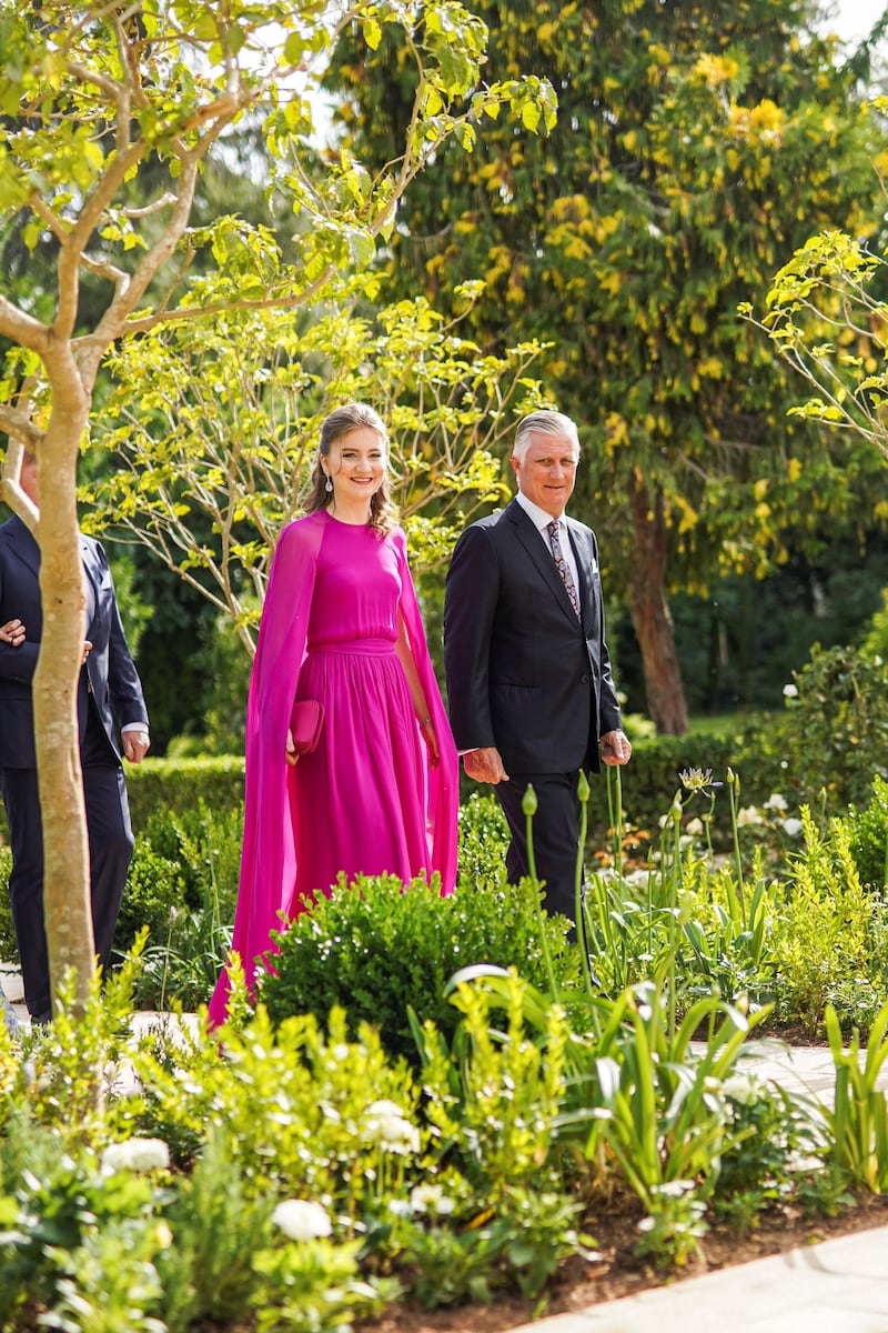 Princess Elisabeth, Duchess of Brabant, wears a pink caped Essentiel Antwerp gown, and arrives with her father King Philippe of Belgium 