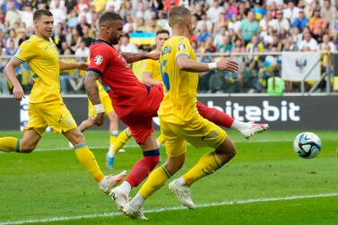 England's Kyle Walker scores his side's goal against Ukraine. AP