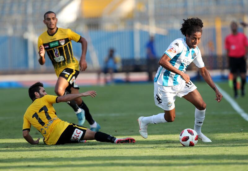 Al-Entag al-Harby player Abdel Rahman Boudy, left, in action against Pyramids FC player Keno during the Egyptian Premier League match in Cairo, Egypt. EPA