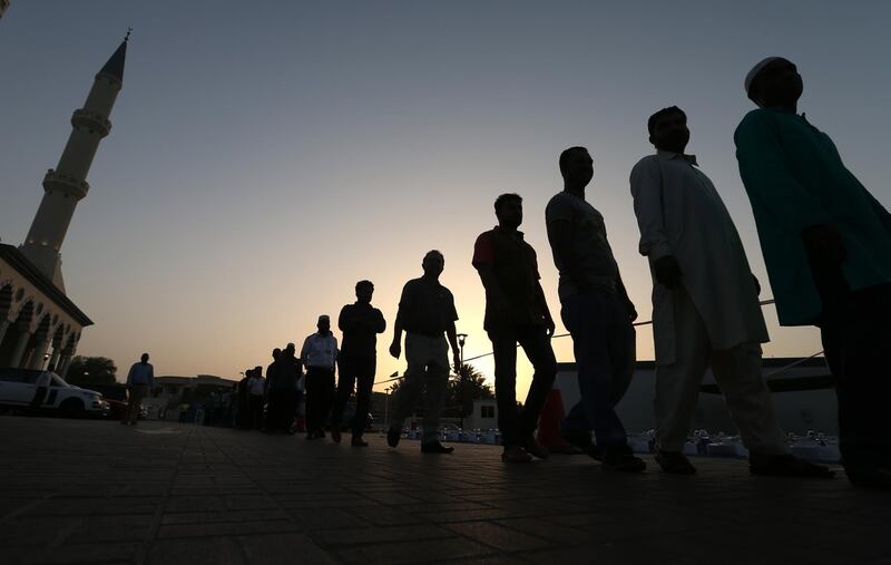 Muslims arrive shortly before sunset to break their fast in Dubai on May 23, 2018. EPA