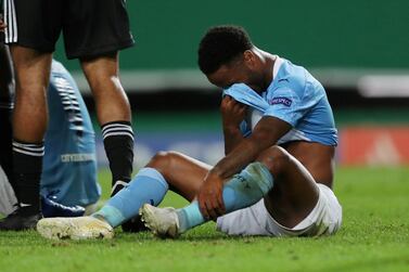 Manchester City's Raheem Sterling looks dejected after the defeat by Lyon. Reuters