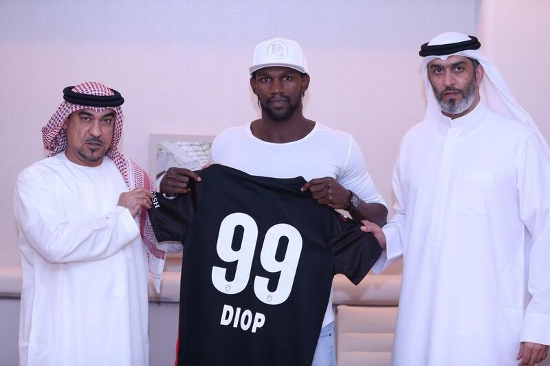 Handout of Makhete Diop at his signing ceremony with new club Al Ahli. Photo courtesy Al Ahli