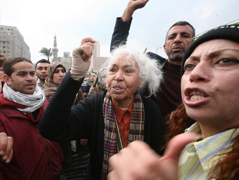 Nawal El Saadawi shouts slogans as she stands with some protesters at Tahrir Square in Cairo, Egypt, on February 7, 2011. EPA