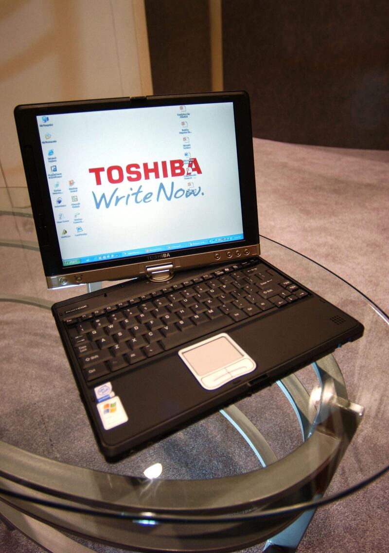 LAS VEGAS, NV - NOVEMBER 20:  The Best of Comdex award winner, the Toshiba Portege 3500 Tablet PC, has a monitor that swivels from the laptop position to the tablet PC position is shown at the COMDEX Fall 2002 computer technology trade show November 20, 2002 in Las Vegas, Nevada.  (Photo by David McNew/Getty Images)