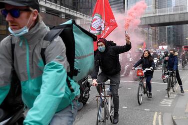 Deliveroo riders demonstrate push for improved working conditions in London. Reuters