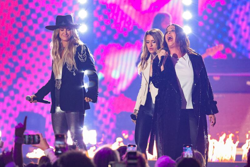 Alanis Morissette, Lainey Wilson and Morgan Wade perform. Reuters